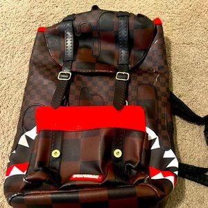 Spray ground backpack